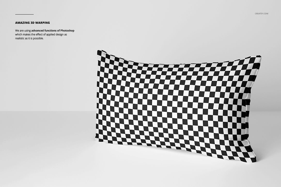Rectangular pillow mockup featuring a bold black and white checkerboard design, displayed in a minimal setting.