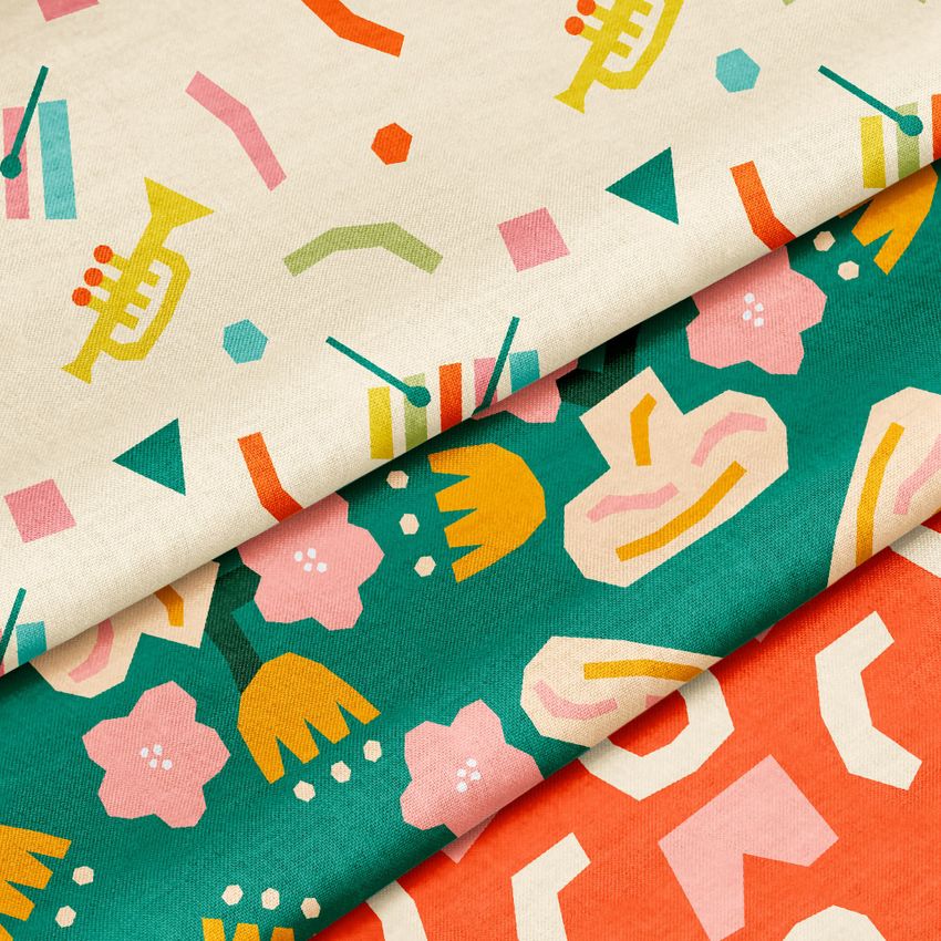 Cotton fabric mockup featuring three folded textiles with colorful abstract and floral patterns in pink, green, and orange tones.
