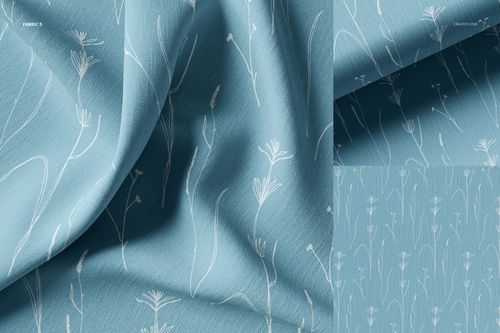 Blue fabric with white botanical pattern displayed in various angles, showing texture and folds in a textile mockup.