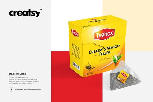 Front view of a yellow rectangular tea box mockup with red and white accents, placed beside a pyramid-shaped tea bag.