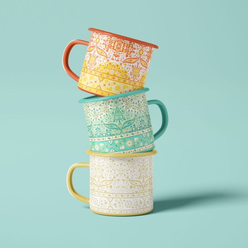 Three enamel mug mockups with intricate floral patterns in orange, teal, and cream, arranged in a balanced vertical stack.