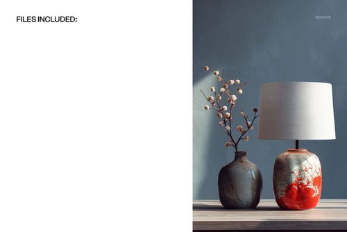 Ceramic lamp with a drum shade mockup on a wooden surface, featuring a red and white marbled base next to a dark vase with branches.