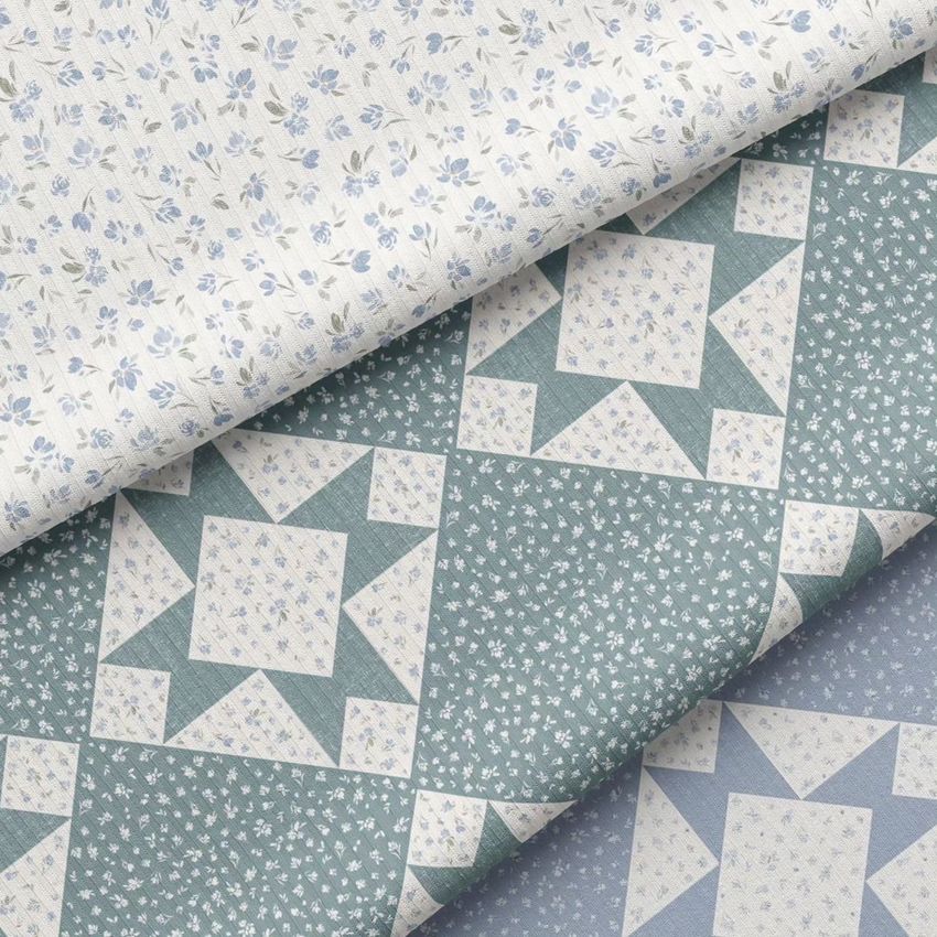 Cotton fabric mockup featuring two overlapping pieces, one with a blue and white quilt pattern and one with small floral prints.