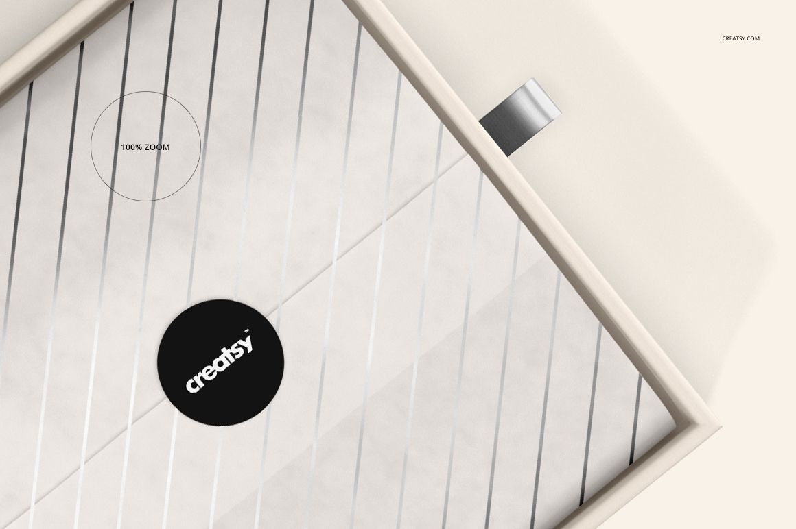 Top view of a rectangular gift box mockup with a diagonal striped pattern and a silver ribbon pull tab.