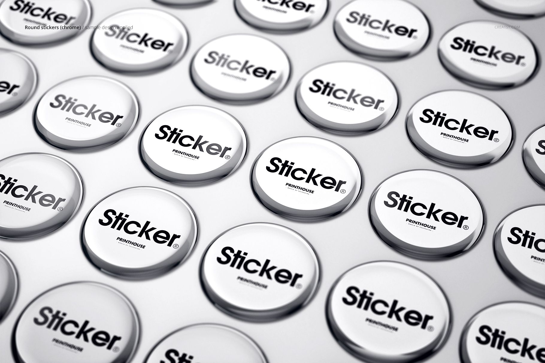 PSD mockup showing several shiny round stickers with black text, organized in rows on a pale background.