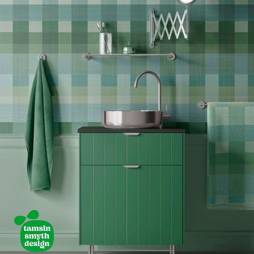 Bathroom wallpaper mockup featuring a green plaid pattern on the wall, green vanity with sink, and matching towels.