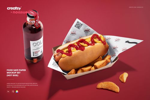 PSD mockup featuring a hot dog with ketchup, potato wedges, and branded food safe paper on a red surface.