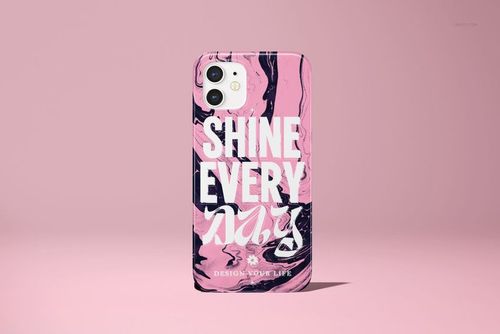 Front view of an iPhone 12 case mockup featuring a glossy finish, pink and black swirled design, and large white lettering.