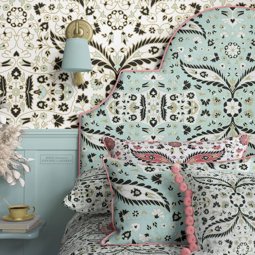 Bedroom mockup featuring patterned pillows, a decorative headboard, and floral wallpaper in soft blue and cream tones.