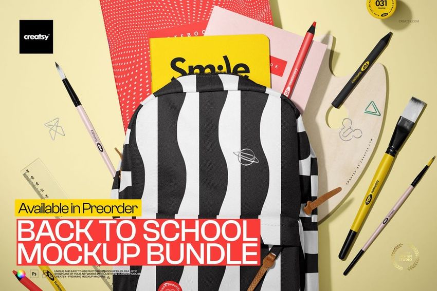 Top view of a black and white striped backpack surrounded by colorful notebooks, pens, pencils, ruler, and paintbrushes on a yellow background.