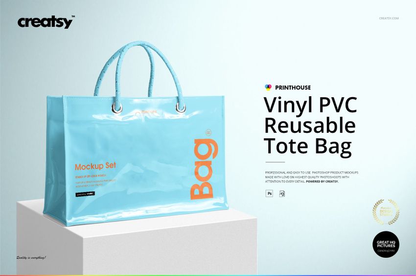 Light blue vinyl PVC tote bag mockup with shiny finish and clear handles, positioned against a minimalist background.