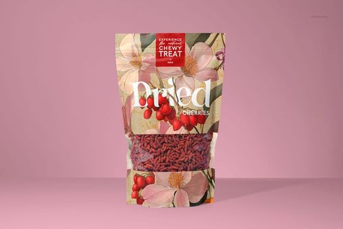 Front view of a paper pouch mockup for dried goji berries, featuring floral illustrations and a clear window, set against a pink background.