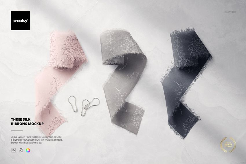 Silk ribbons mockup featuring three colors and floral designs, arranged side by side on a marble-like background.