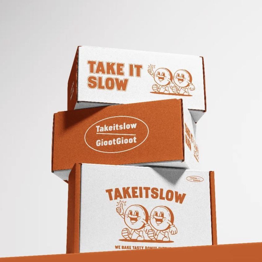 Three mailing box mockups stacked on each other, featuring orange and white colors with playful cartoon graphics and bold text.