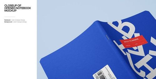 Opened notebook mockup with a vivid blue cover, large white text, and a red label, shown from a close perspective.