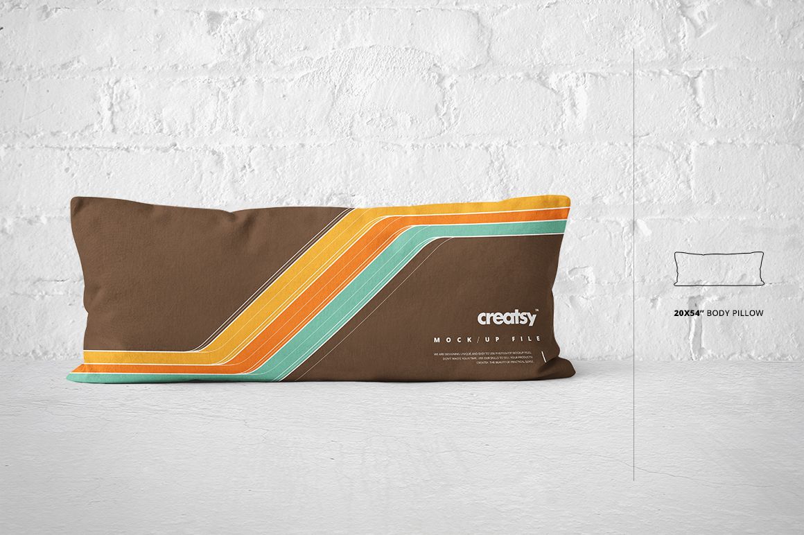Long pillow mockup in brown with colorful diagonal stripes, displayed against a bright white brick background, front perspective.