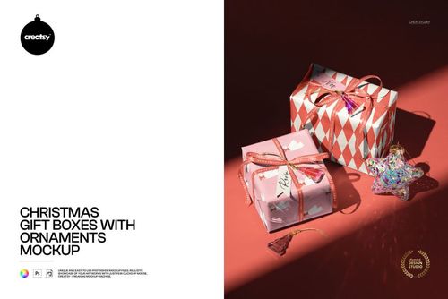 PSD mockup of holiday gift boxes featuring ribbons and shiny ornaments on a red background, top perspective.