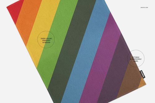 Kitchen towel mockup featuring diagonal rainbow stripes, shown from a top view on a white background.