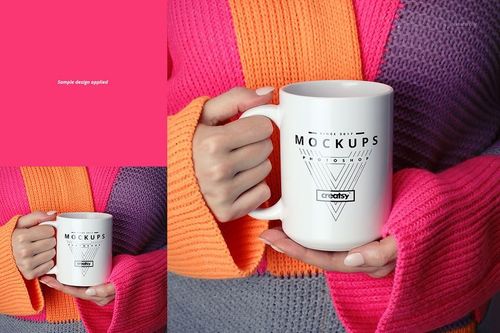 Front view of a white ceramic mug held by hands in a colorful pink, orange, and purple sweater, featuring a geometric mockup design.