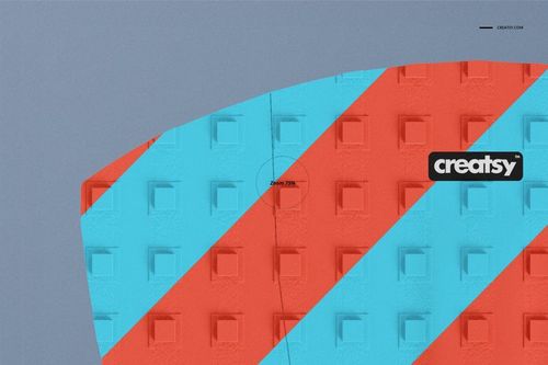 Surfboard traction pad mockup featuring raised square texture and bold red and blue stripes, viewed from above.