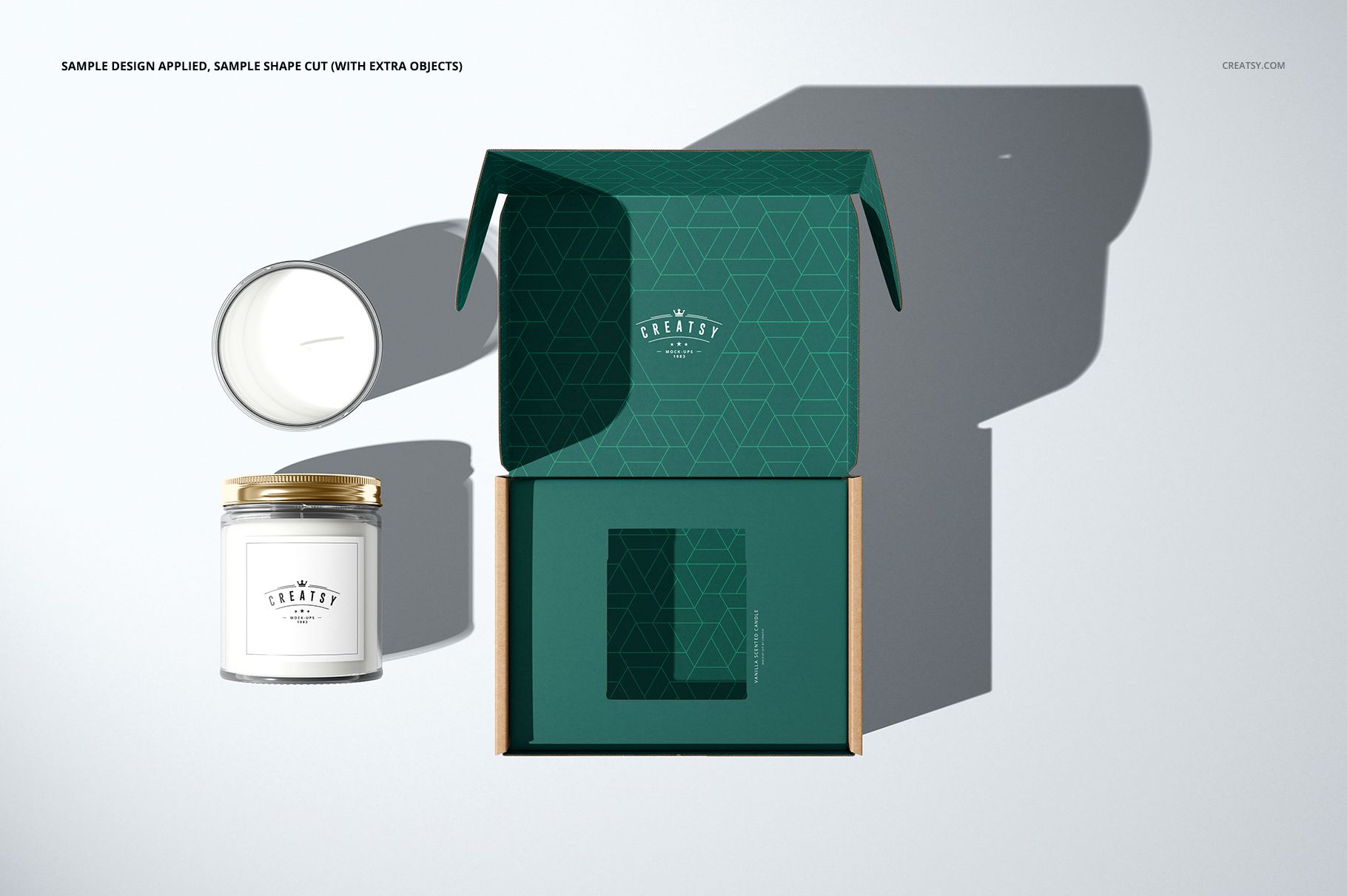 Insert tray generator mailing box mockup set displayed from above, featuring green packaging and candle jar props.