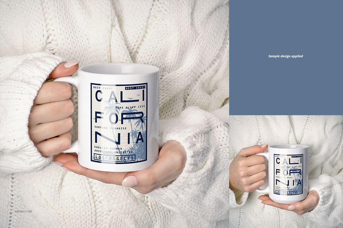 White ceramic mug with a blue California-themed design held by hands in a white knitted sweater, front view.