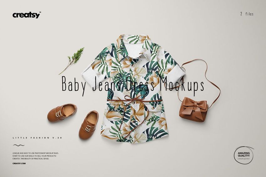Baby jeans dress mockup featuring a leafy pattern, styled with brown baby shoes, a bow handbag, and decorative greenery.