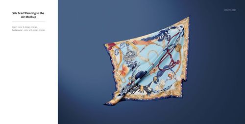 Elegant silk textile mockup showing a detailed pattern of chains and flowers, suspended on a blue backdrop.