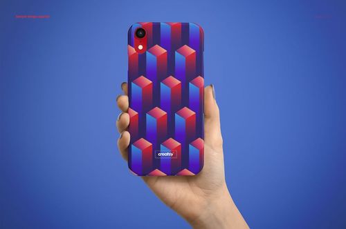 Close-up of a matte iPhone XR case mockup with a vibrant 3D cube design in red and blue, held against a blue backdrop.