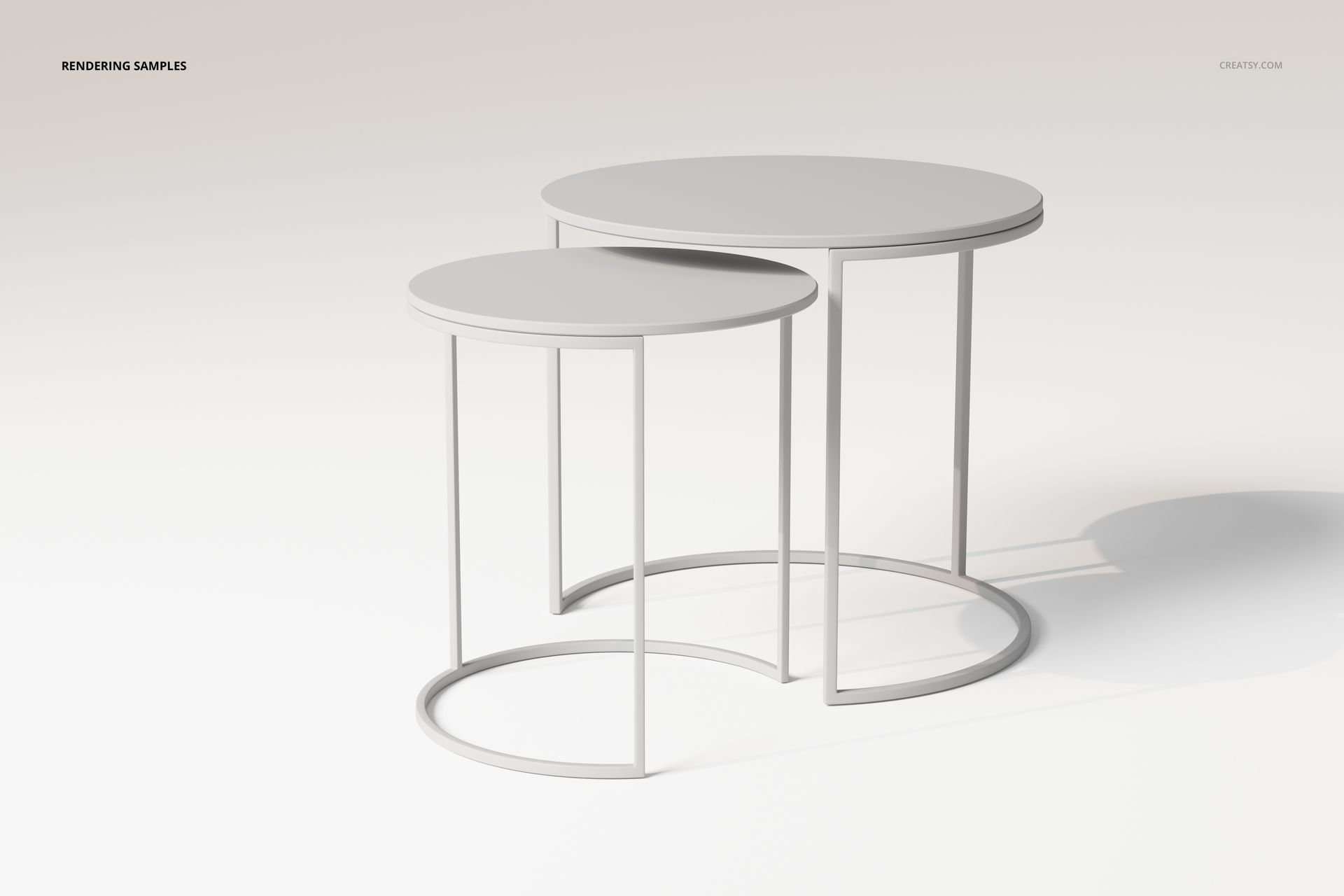 Two round nesting coffee tables with minimalist white tops and thin metal legs, shown on a light background.