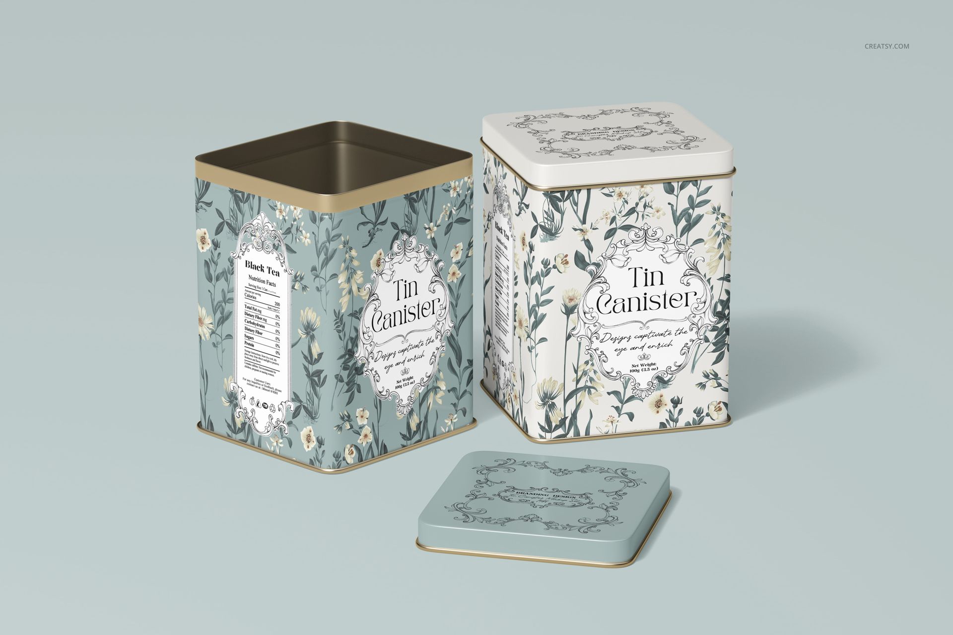 Tin canister mockup set featuring two square metal containers with botanical designs, one open and one closed.