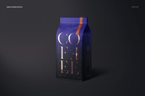 Matte finish coffee bag mockup with bold gold lettering and blue background, shown in a three-quarter front view.