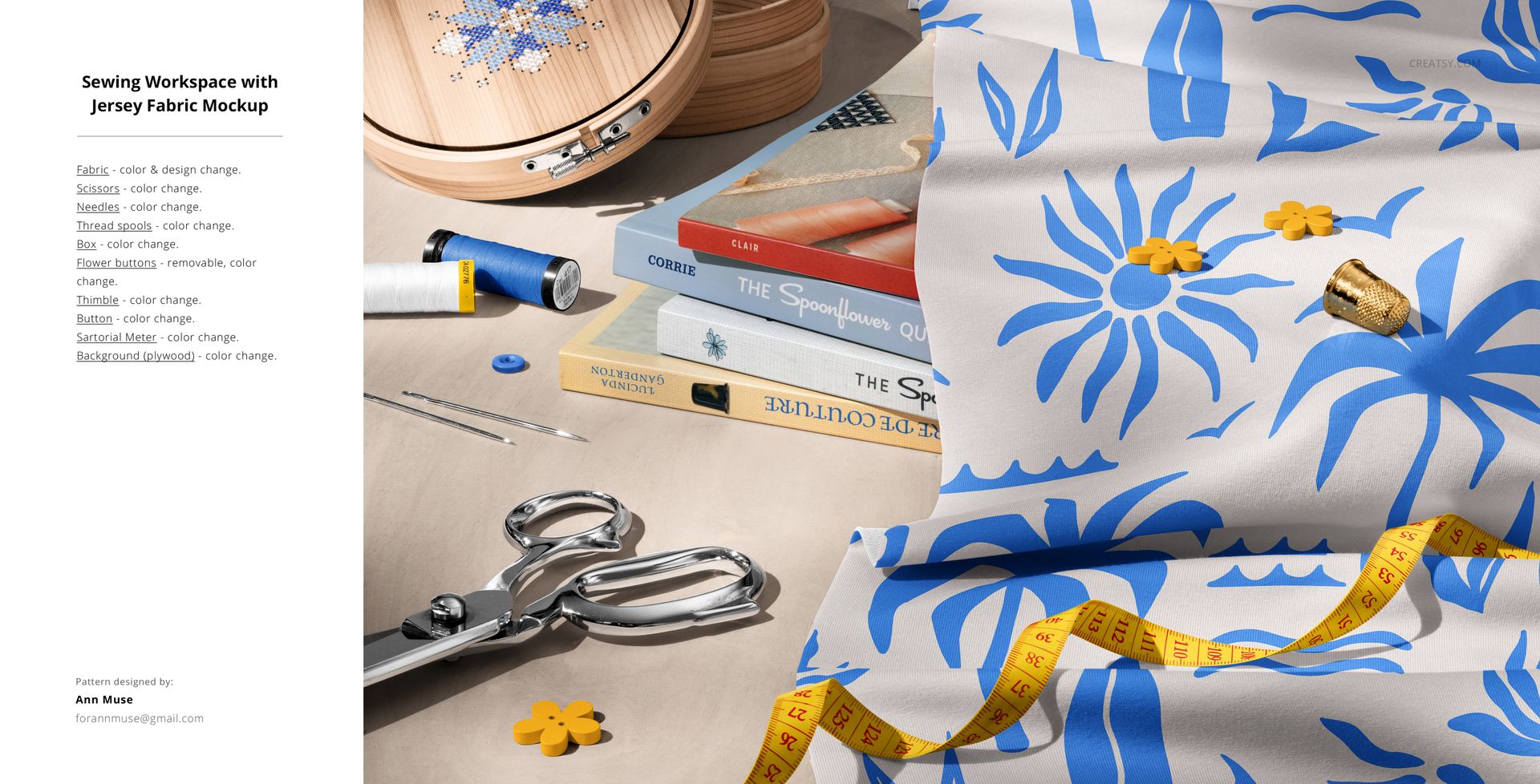Jersey fabric mockup featuring blue botanical prints, arranged near sewing tools, books, and a yellow measuring tape.
