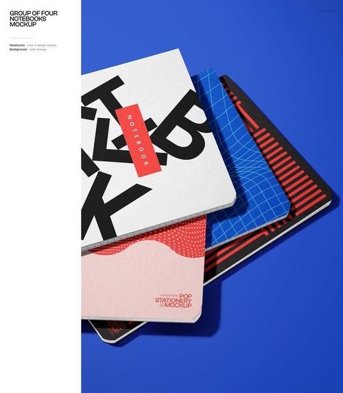 Top view of four stacked notebooks with different cover designs and colors on a vibrant blue background.