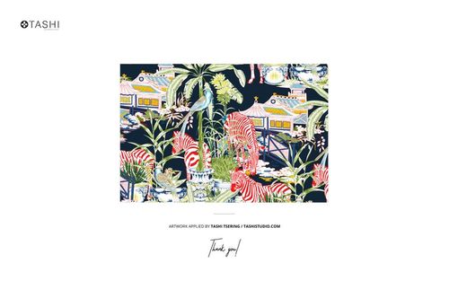 Colorful fabric mockup displaying a jungle-inspired pattern with lush greenery, zebras, and architectural elements.