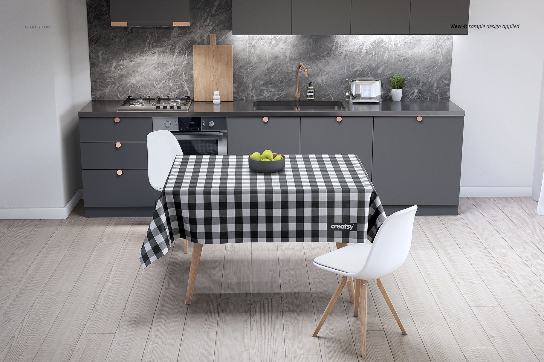 Rectangular dining table with a bold checkered tablecloth mockup in a contemporary kitchen setting with gray cabinets.