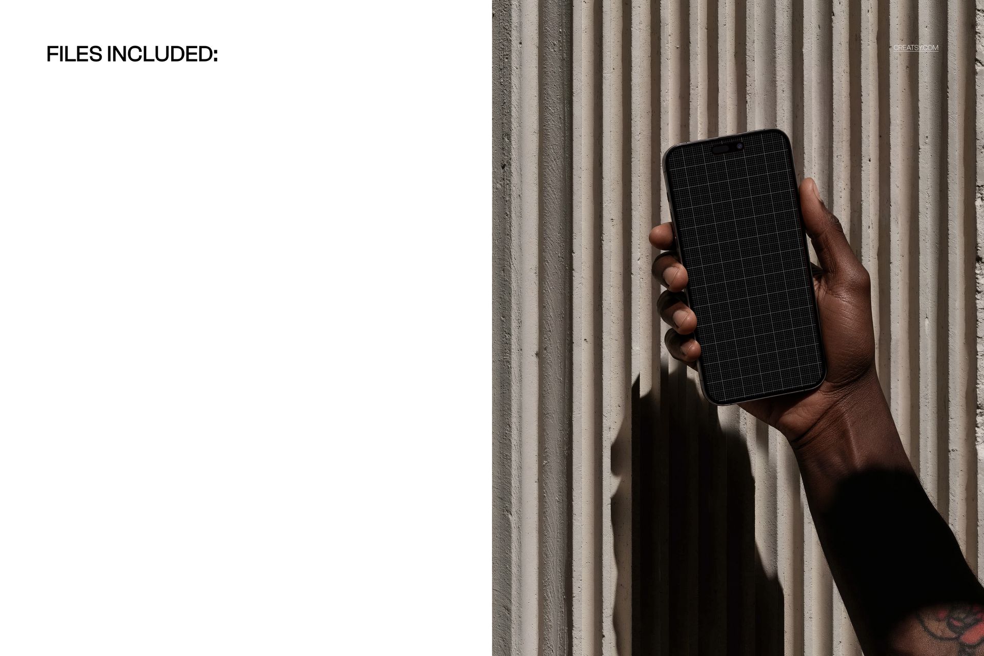 PSD mockup showing a person holding an iPhone against a textured concrete wall with strong shadow.
