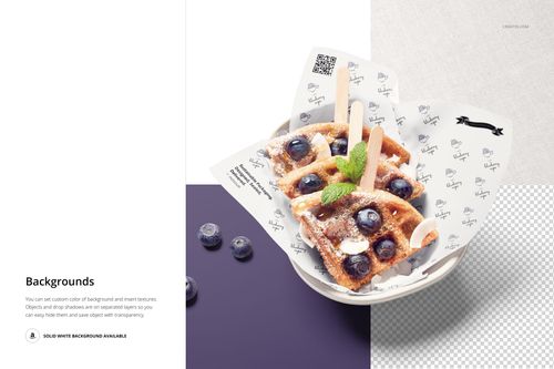 Top view of a bowl with waffles topped with blueberries and mint, wrapped in patterned food safe paper mockup.