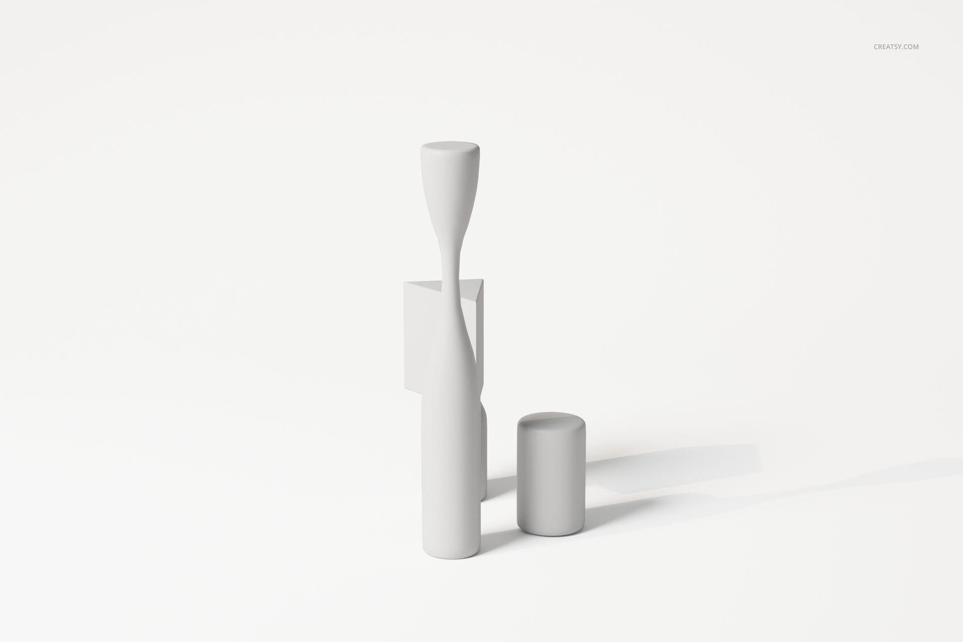 Front view of two cubist style decorative sculptures in matte white, featuring abstract geometric shapes on a plain surface.