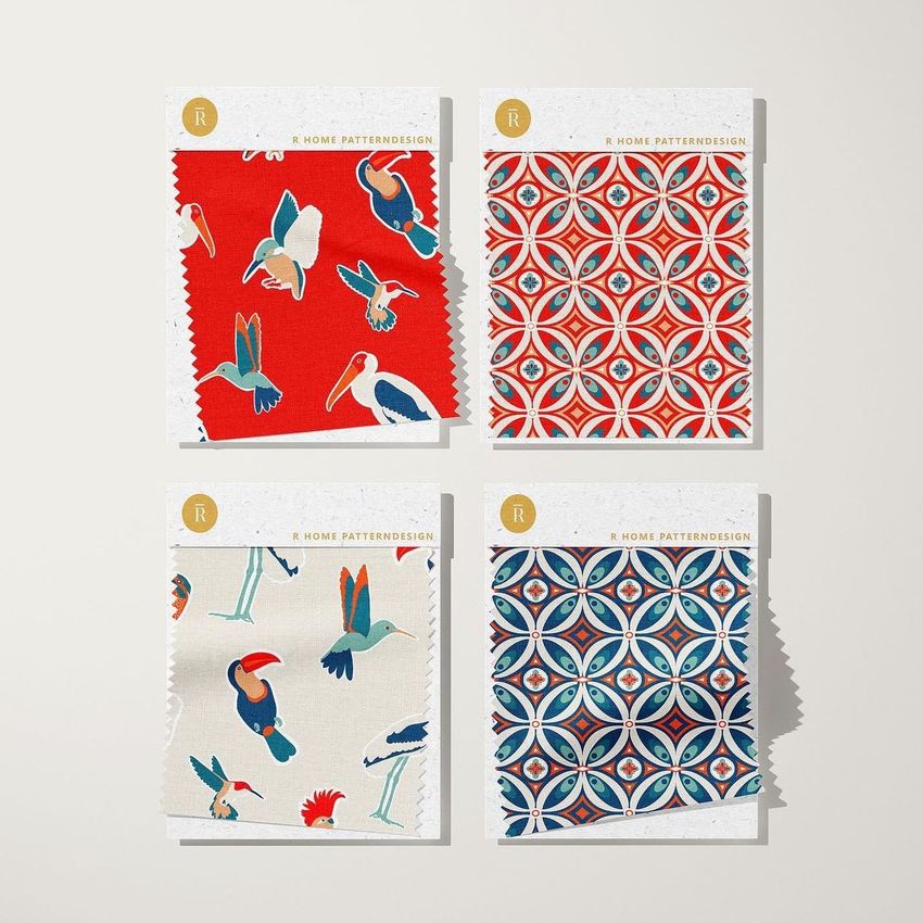 Fabric swatches mockup featuring four patterned fabric samples arranged in a grid on a light surface with soft shadows.
