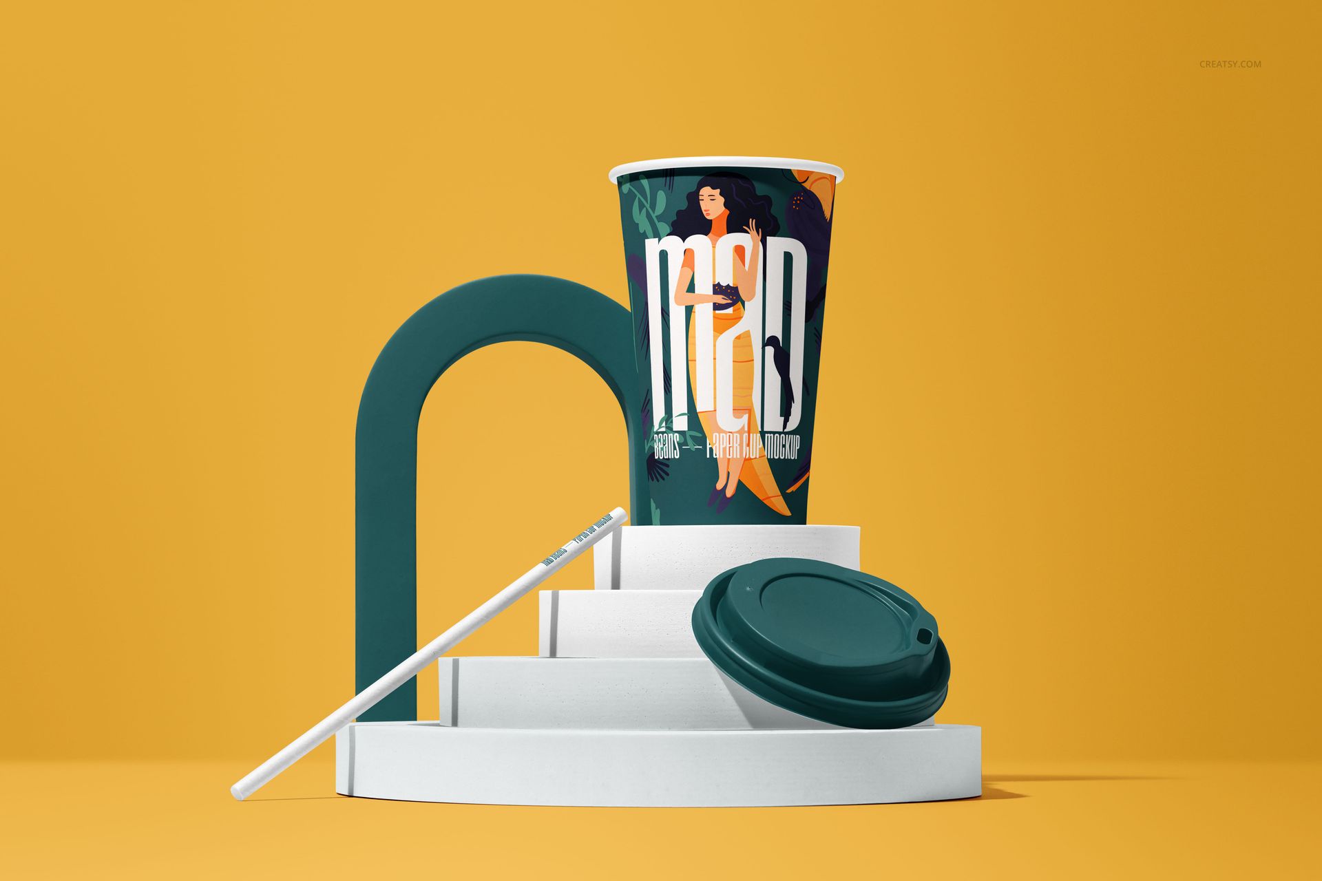 PSD mockup showing a paper cup with a graphic pattern, green lid, and straw arranged on white geometric platforms.