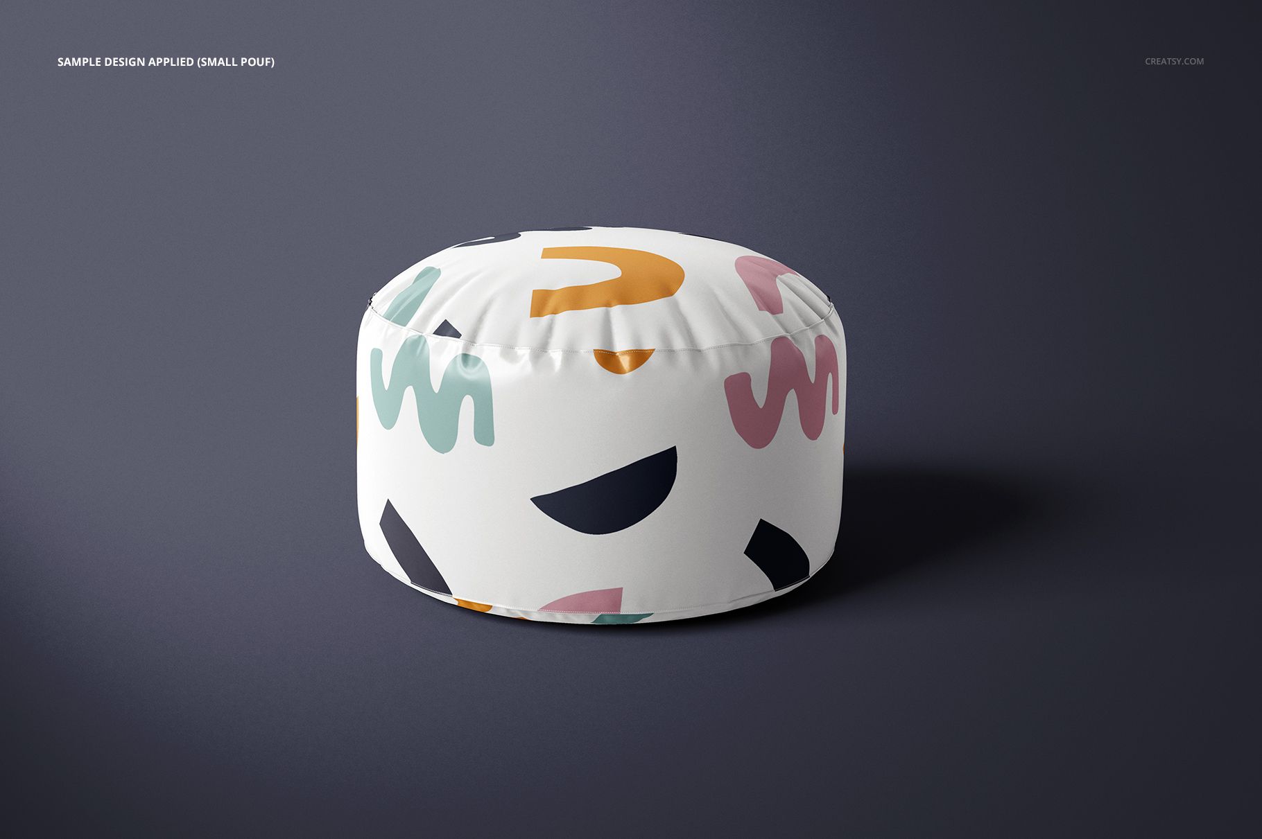Small round pouf mockup featuring a white surface decorated with multicolored abstract patterns, front view.