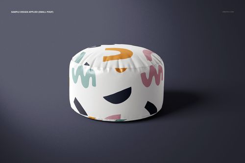 Small round pouf mockup featuring a white surface decorated with multicolored abstract patterns, front view.