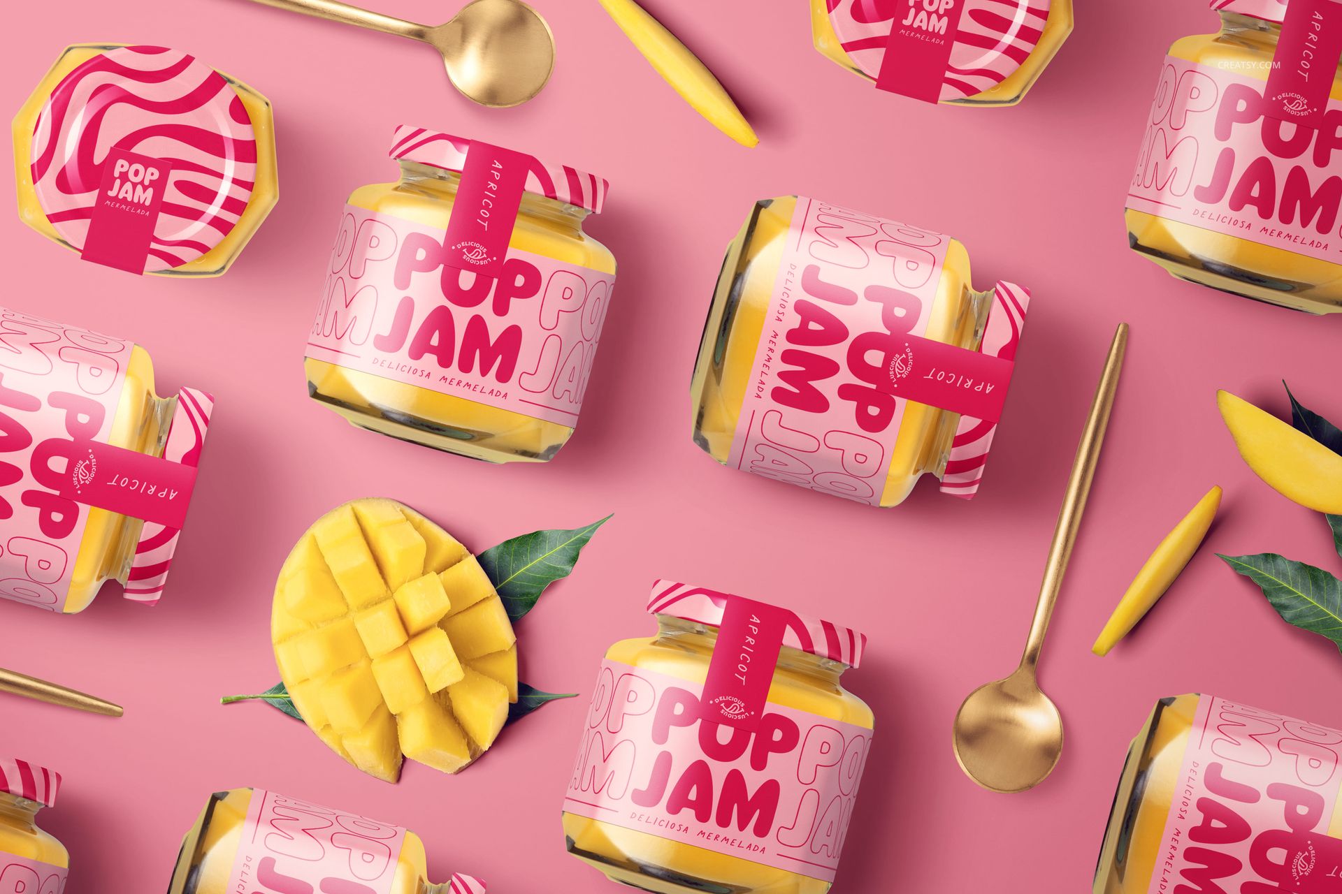 PSD mockup featuring jam jars with vibrant pink lids and labels, mango fruit segments, and decorative spoons.