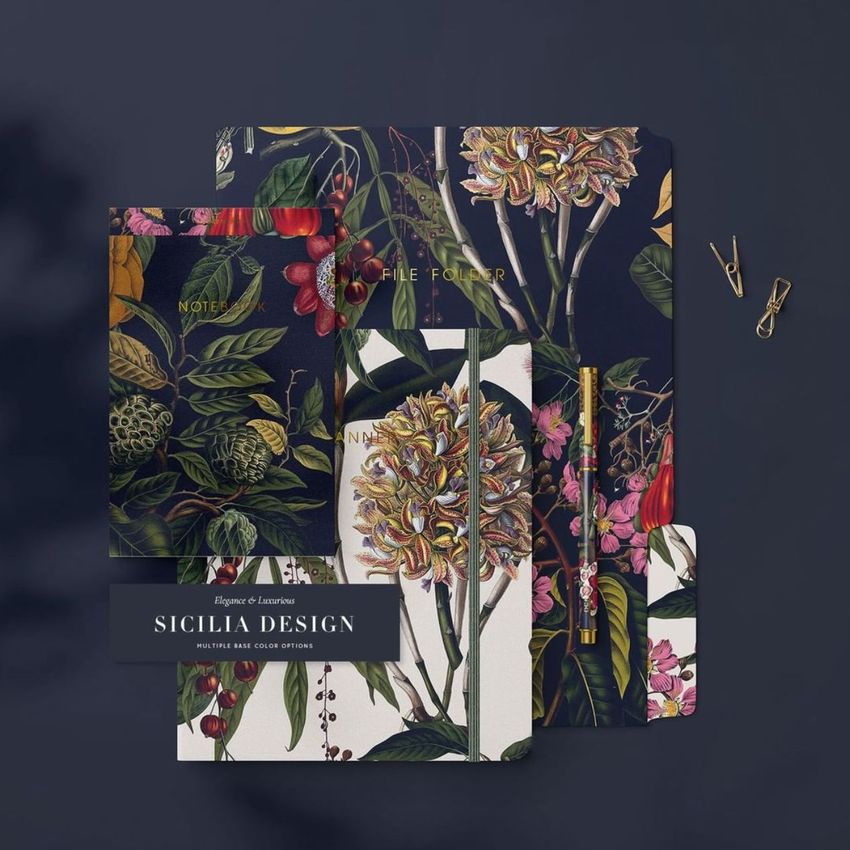Stationery set mockup featuring notebooks and folders with intricate floral and botanical illustrations on dark and light backgrounds.
