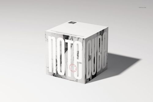 Note cube mockup featuring a cube-shaped stationery item with marble texture and oversized white lettering, front view.