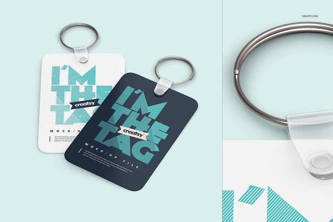 PSD mockup showing two flat keychains in contrasting colors, arranged side by side on a pastel blue surface.