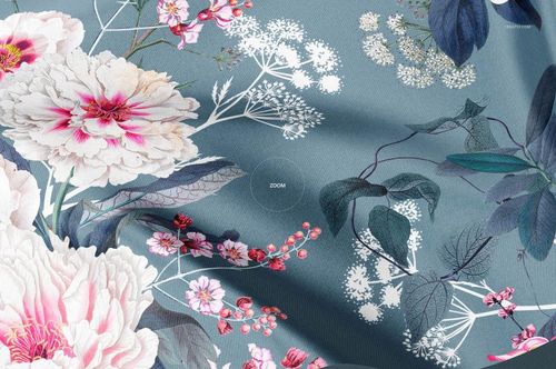 Close-up of a silk swatch mockup featuring detailed flowers and leaves on a blue background with visible texture.