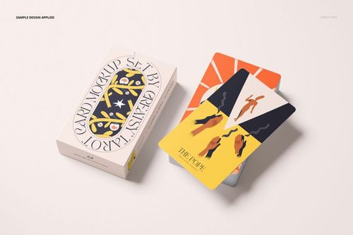 Tarot cards mockup showing a deck with illustrated cards and a decorative box, displayed on a light surface, top view.