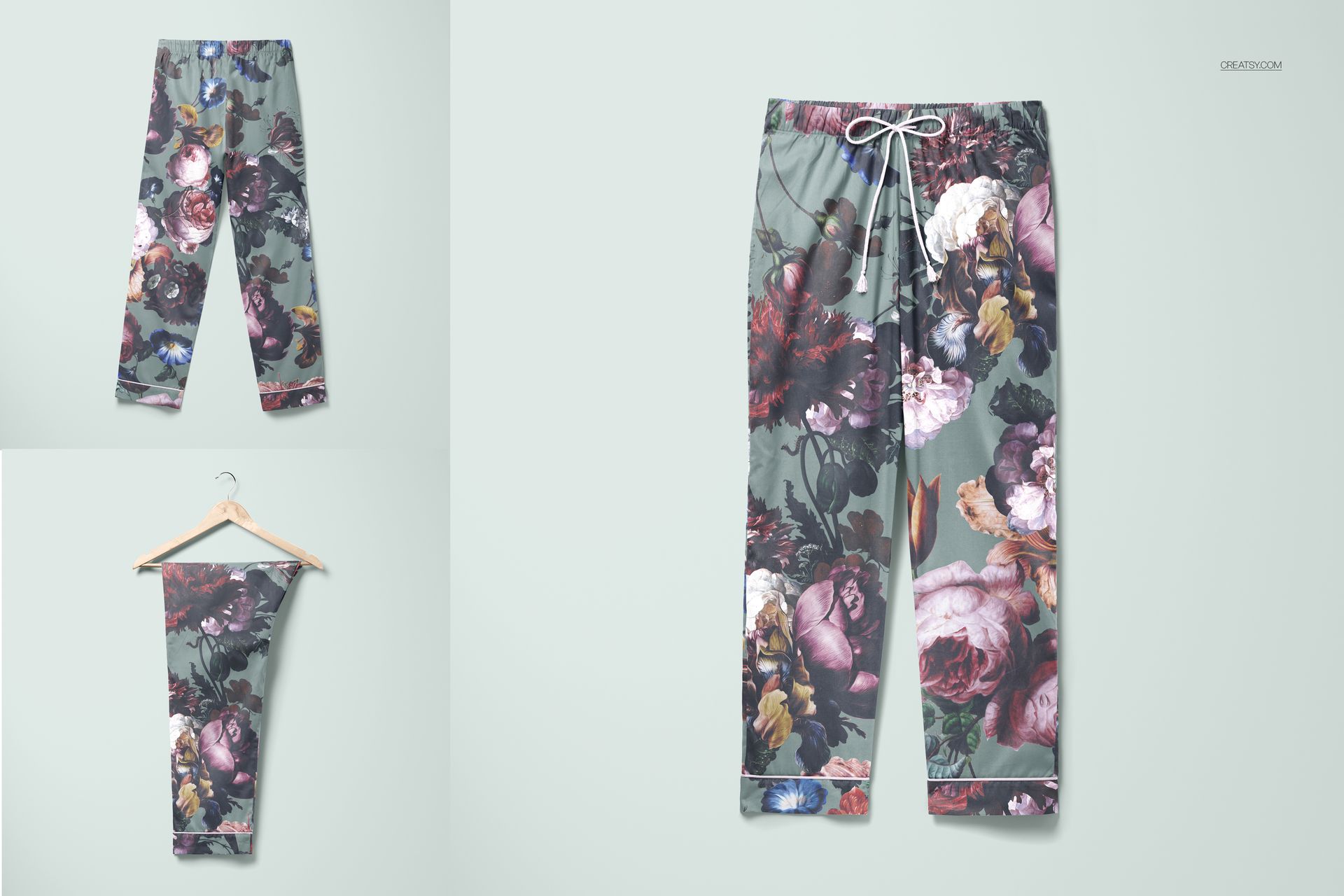 Front view of pajama pants mockup with floral pattern in shades of pink, purple, and green on a light background.